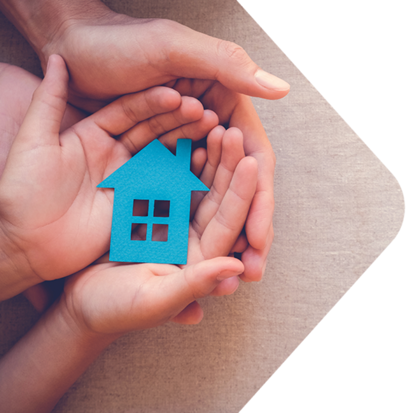 Image showing 2 sets of hands holding a model house
