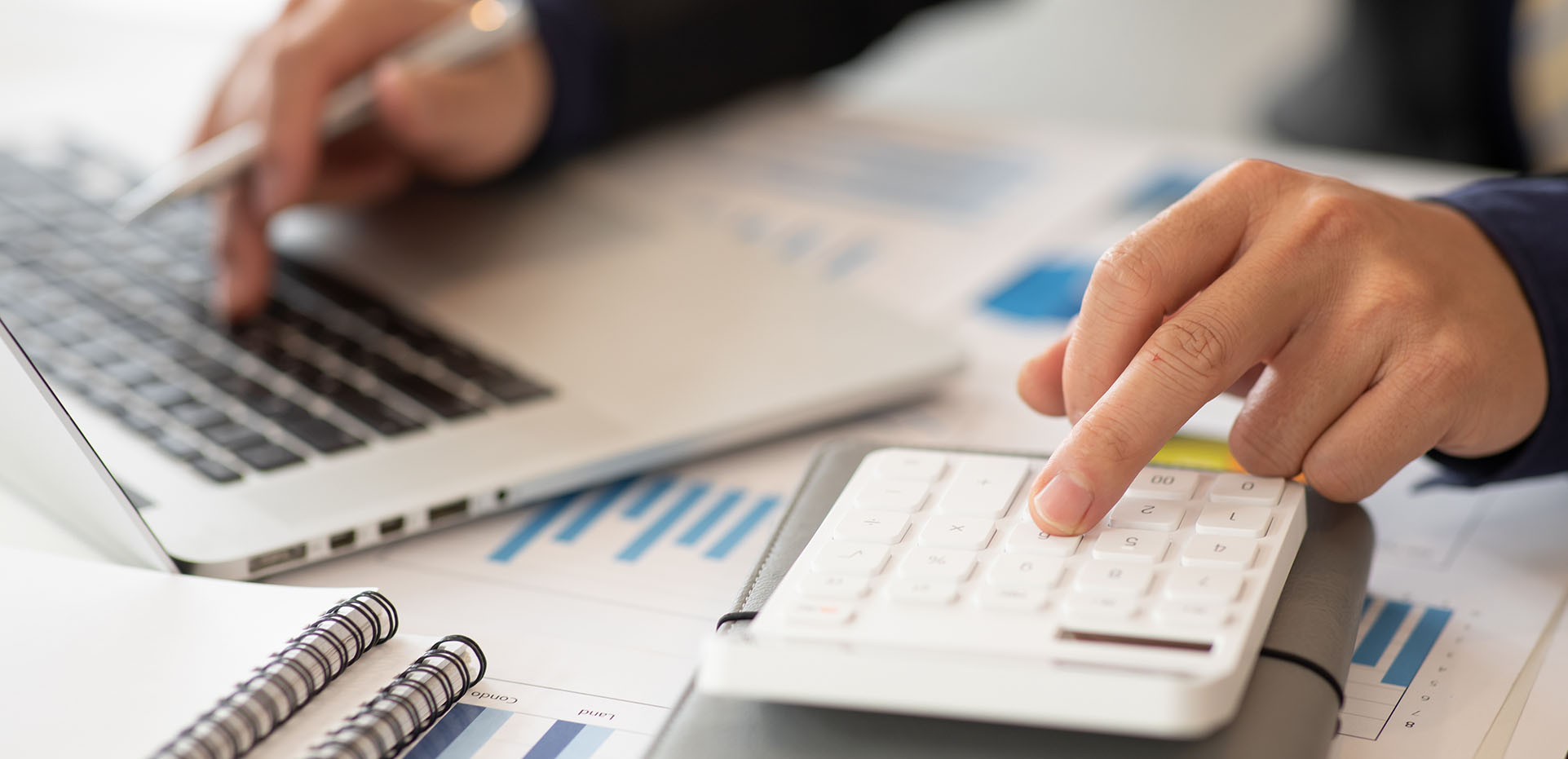 Image showing a business man calculating costs