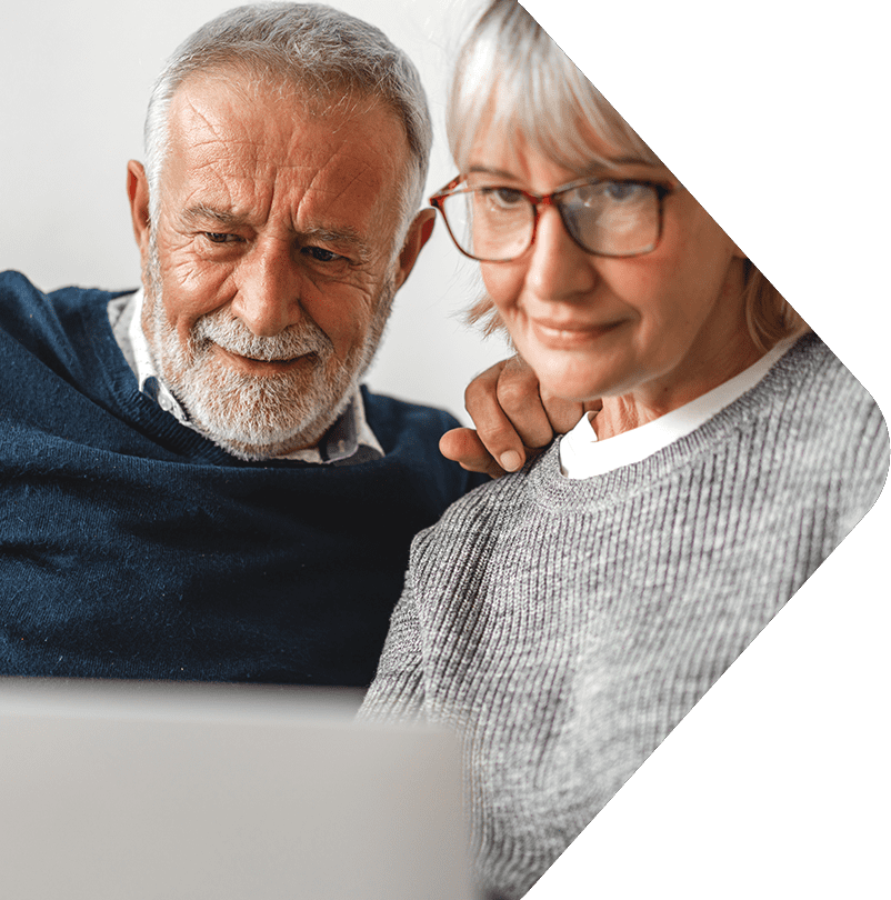 Image showing a couple looking at their laptop