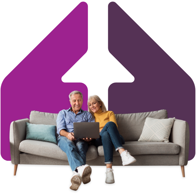 Image showing an older couple looking at their laptop together