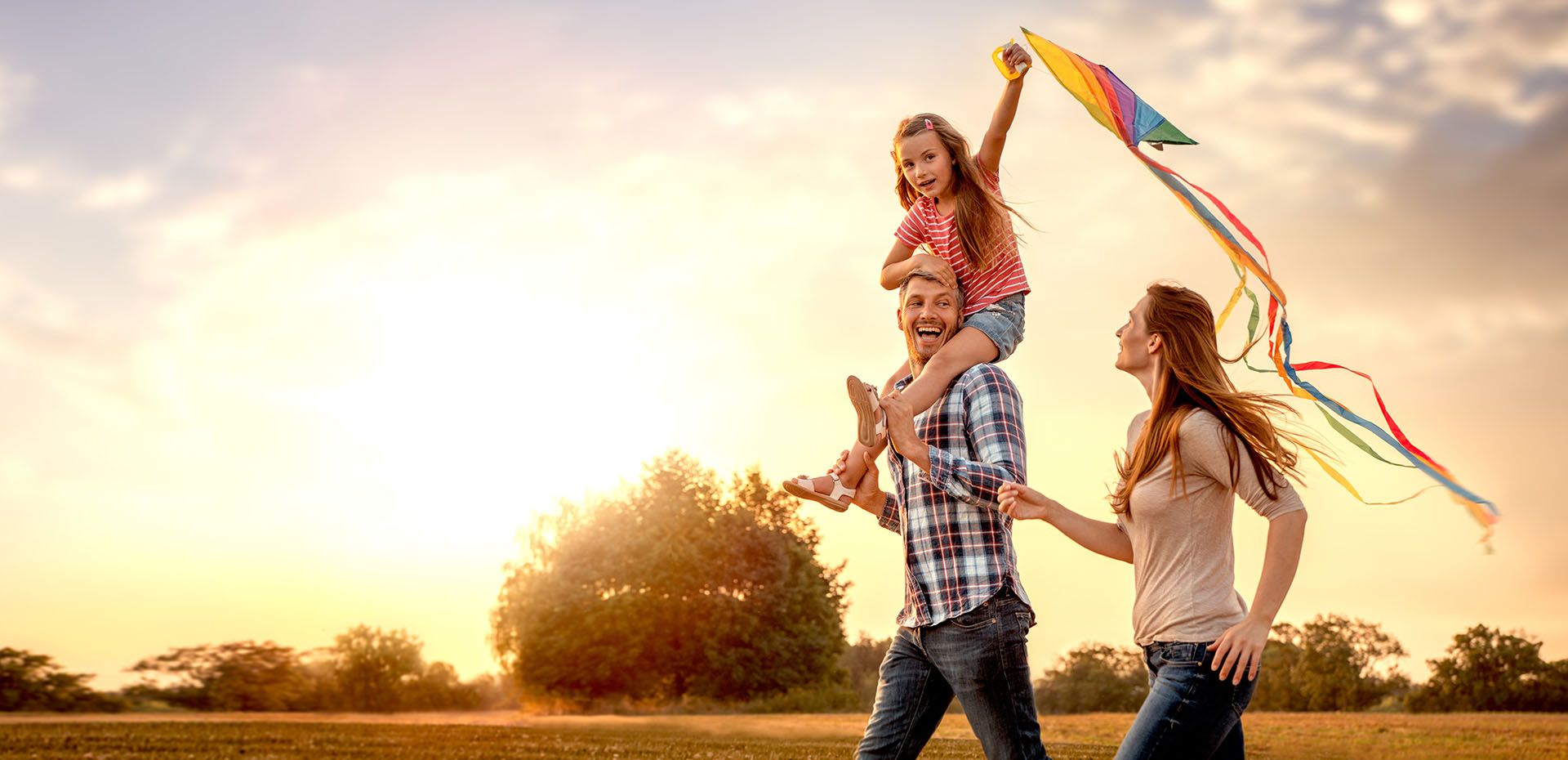 Image showing a family of 3 with a kite