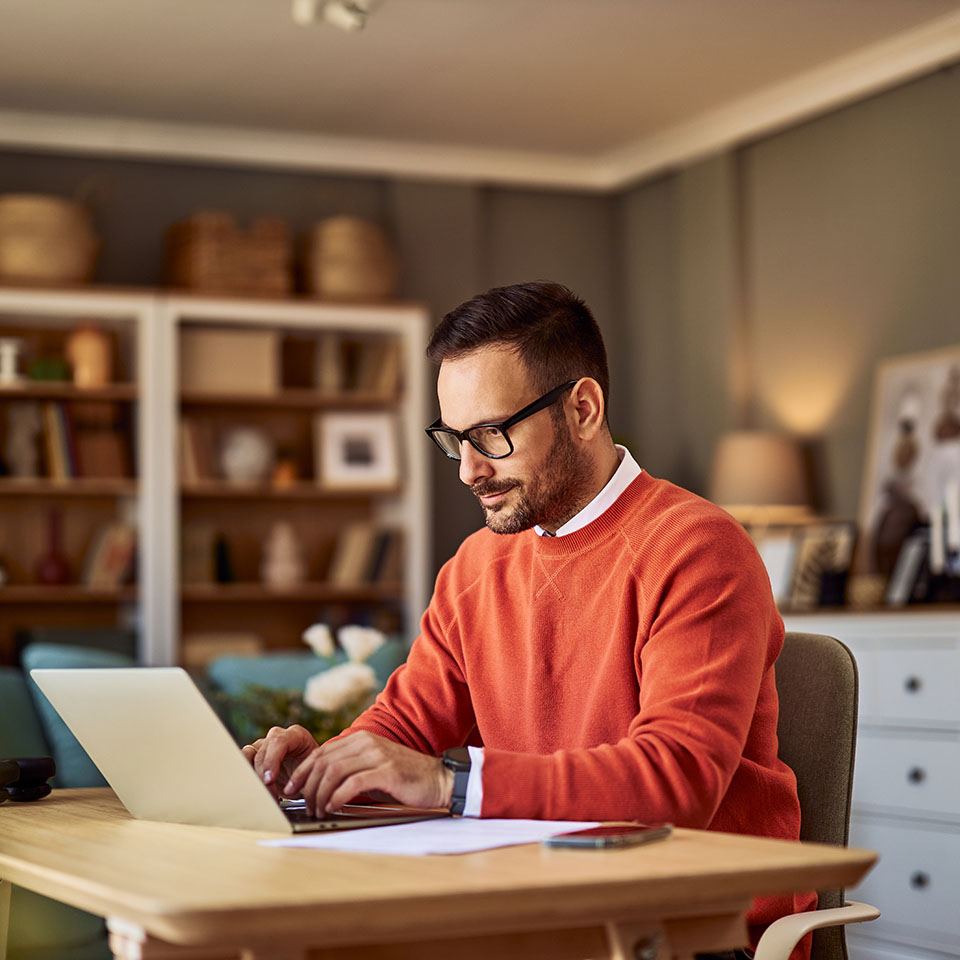 Image showing a man working on his laptop