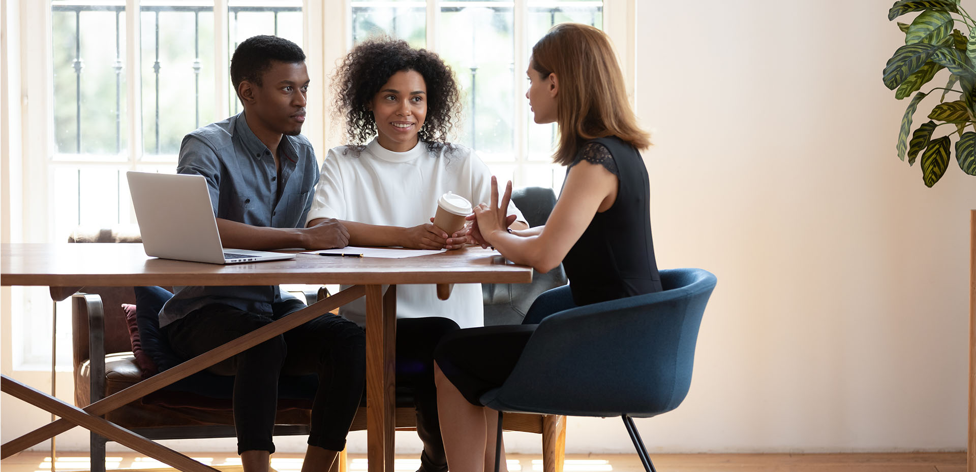 Image showing a couple sitting with a mortgage broker