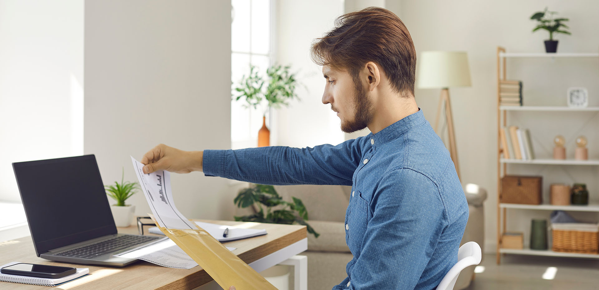 Image showing a man organising paperwork