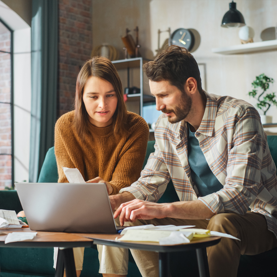 couple working on a laptop