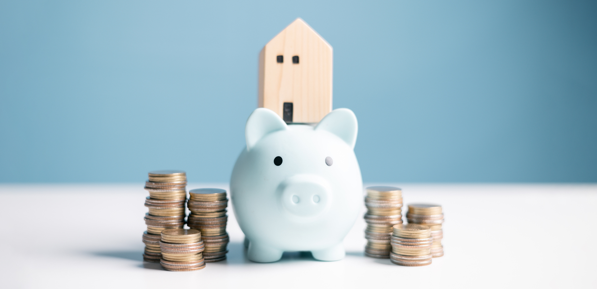 Image showing a piggy bank, coins and a house