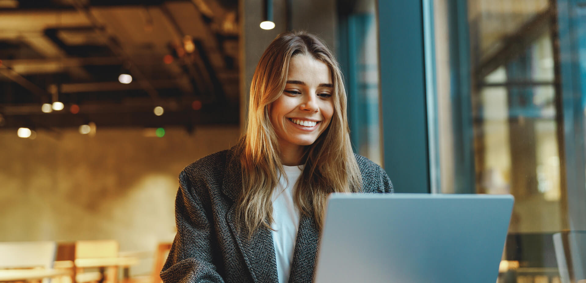 Image showing a lady working on a laptop
